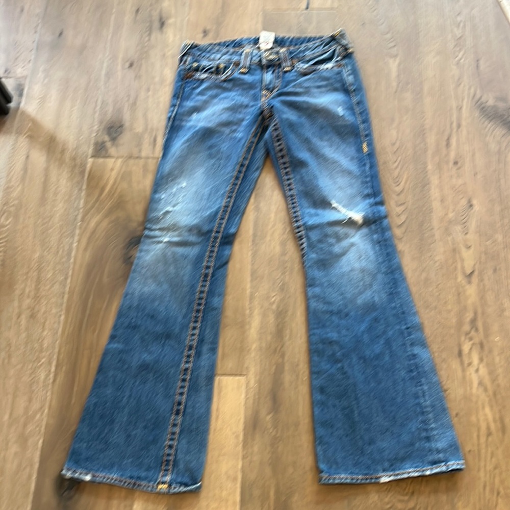 True Religion size 30 wide leg faded jean.